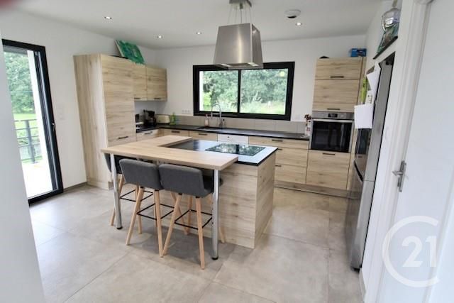 Afficher la photo en grand maison à vendre - 4 pièces - 150.0 m2 - CHAUVIGNE - 35 - BRETAGNE - Century 21 Gambetta