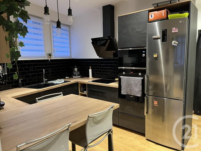 Appartement T2 à louer - 2 pièces - 54.66 m2 - FOUGERES - 35 - BRETAGNE - Century 21 Gambetta